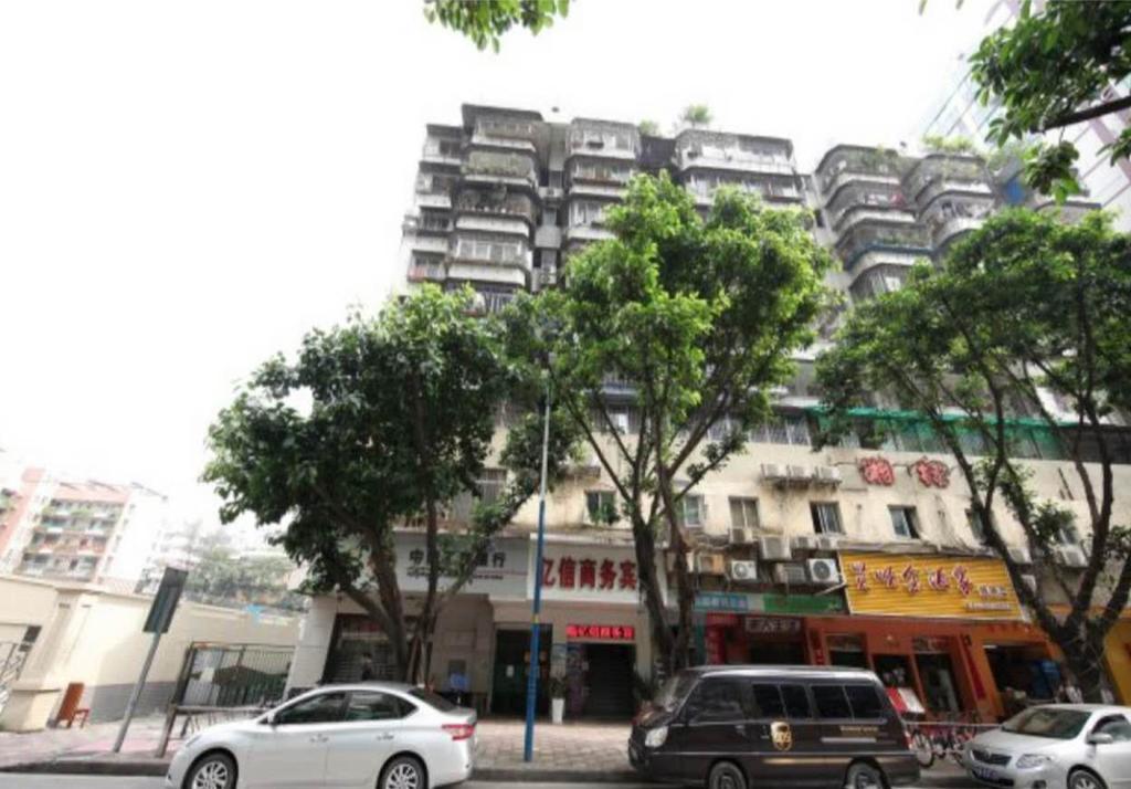 Yixin Business Hotel Cantón Exterior foto