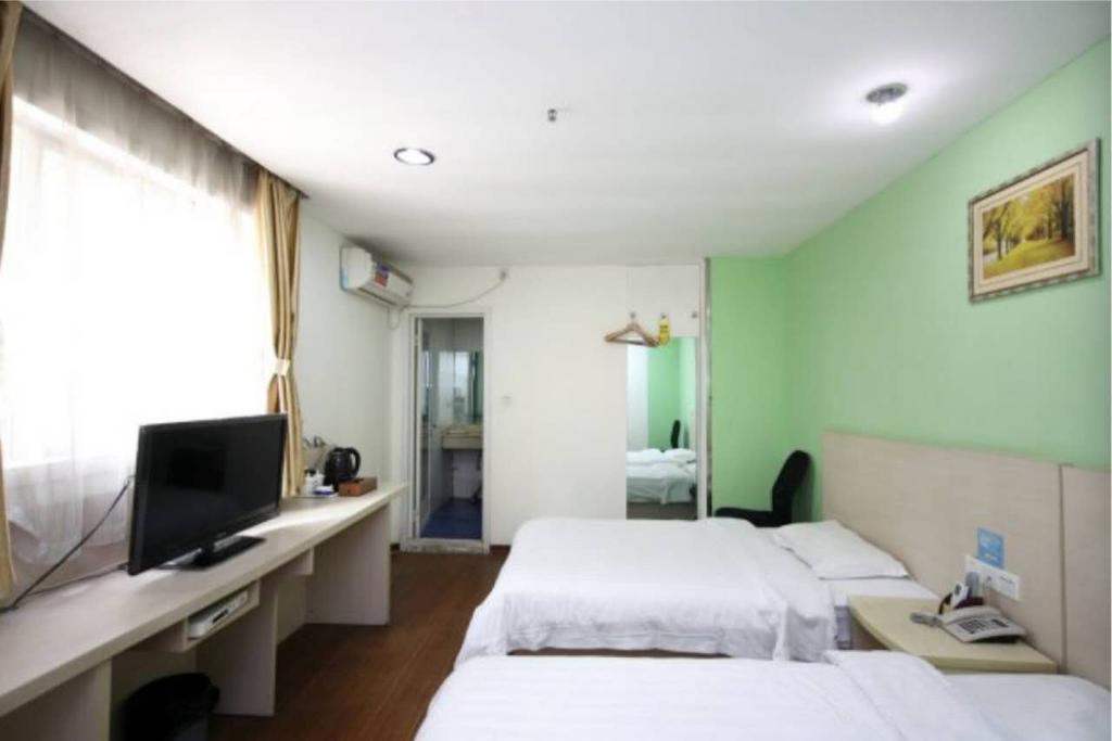 Yixin Business Hotel Cantón Exterior foto
