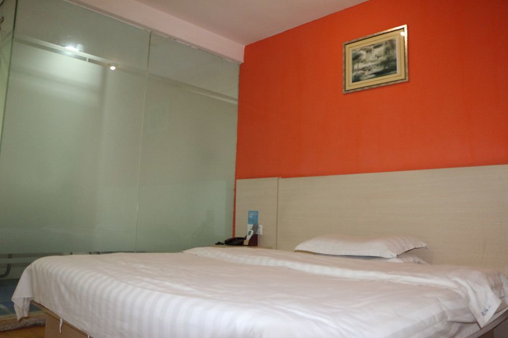 Yixin Business Hotel Cantón Exterior foto